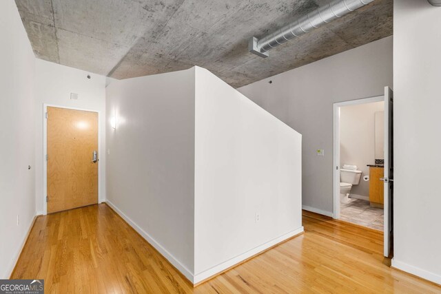 hall featuring hardwood / wood-style flooring