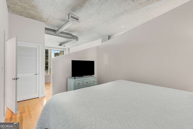 bedroom featuring light wood-type flooring