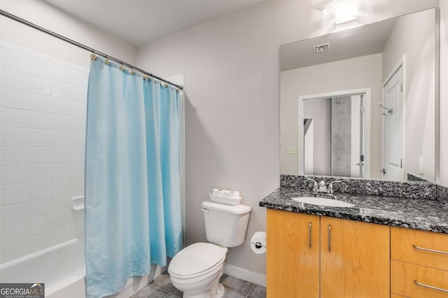 full bathroom featuring vanity, toilet, shower / tub combo with curtain, and tile patterned floors