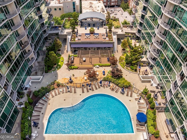 view of swimming pool with a patio