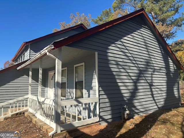 view of home's exterior with a porch