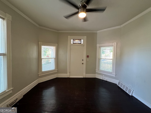 foyer featuring crown molding, wood-type flooring, and ceiling fan