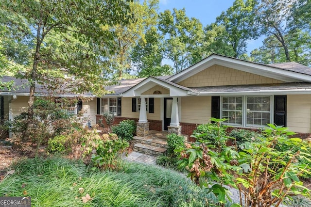 5775 Lakeshore Dr, Buford, GA 30518 - view of front of home with brick siding and a porch
