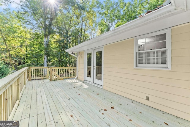 5775 Lakeshore Dr, Buford, GA 30518 - wooden deck featuring view of wooded area