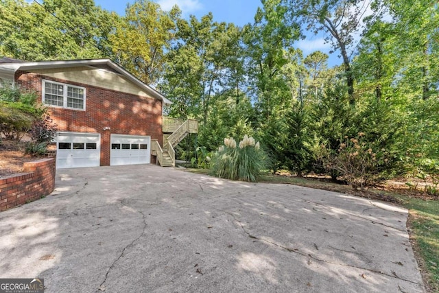 view of home's exterior with a garage