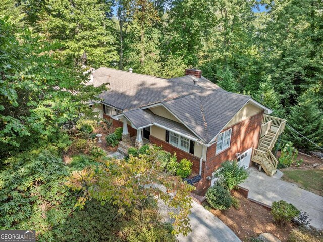 5775 Lakeshore Dr, Buford, GA 30518 - view of subject property featuring a heavily wooded area