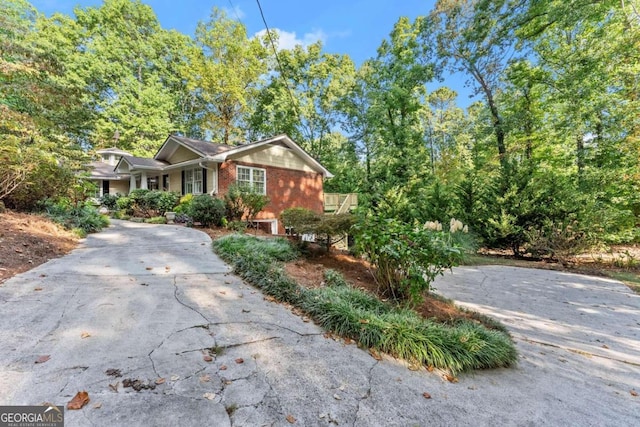 5775 Lakeshore Dr, Buford, GA 30518 - view of front of home featuring brick siding and concrete driveway
