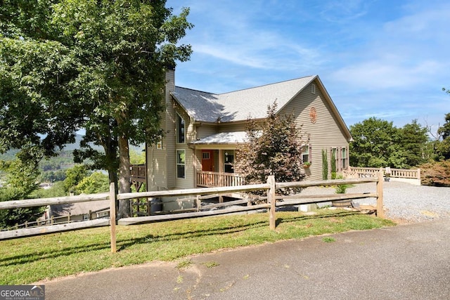 view of home's exterior featuring a lawn