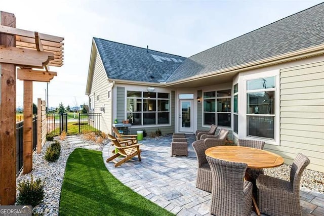 rear view of house with a patio area