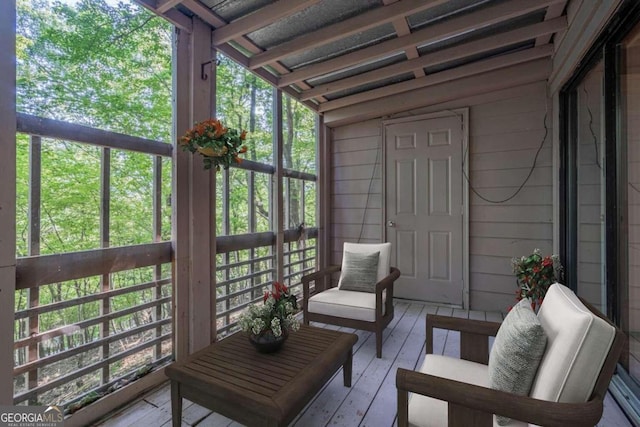 sunroom with vaulted ceiling