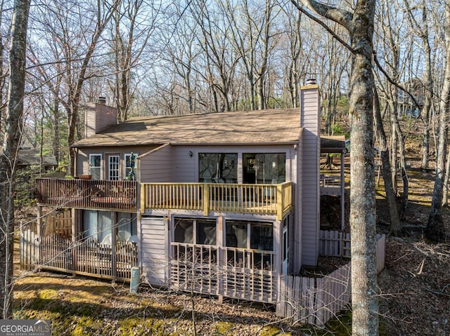 200 Villa Rd Unit 126, Jasper, GA 30143 - back of house featuring a chimney and a balcony