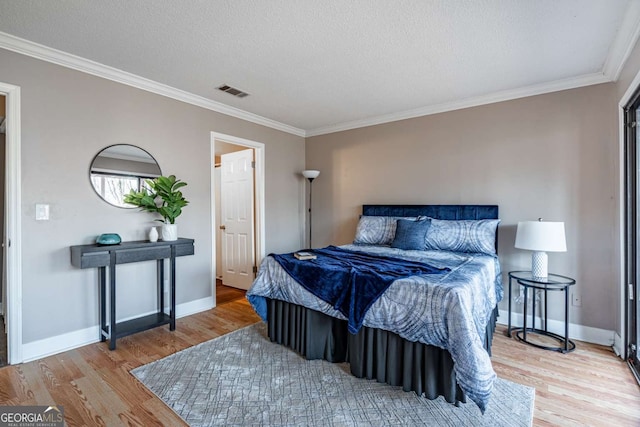 200 Villa Rd Unit 126, Jasper, GA 30143 - bedroom with crown molding, wood finished floors, and a textured ceiling