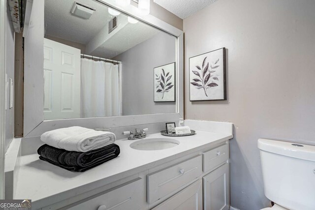 200 Villa Rd Unit 126, Jasper, GA 30143 - bathroom featuring vanity and a textured ceiling