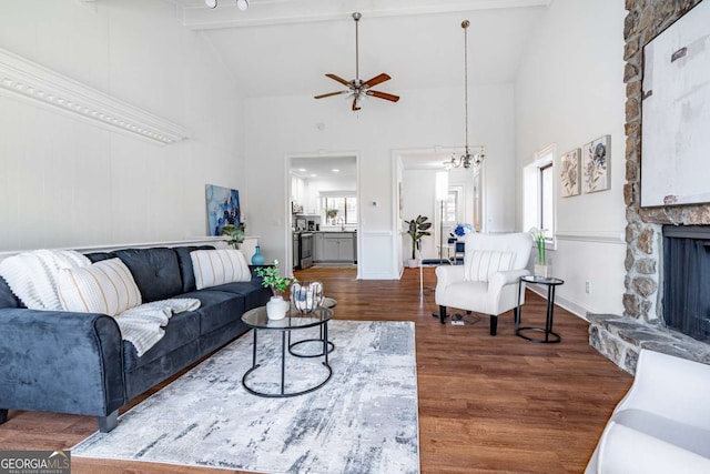 200 Villa Rd Unit 126, Jasper, GA 30143 - living room with wood finished floors, ceiling fan, a fireplace, high vaulted ceiling, and beamed ceiling