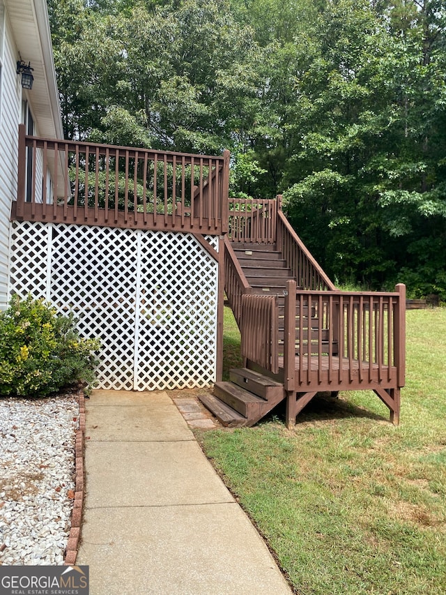 deck featuring a lawn