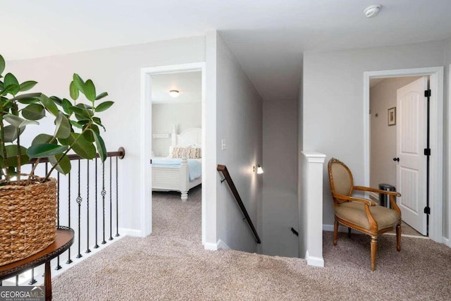 corridor with carpet flooring