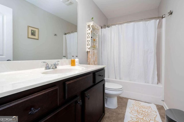 full bathroom with vanity, toilet, tile patterned floors, and shower / bath combo with shower curtain