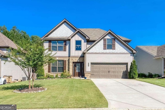 craftsman-style house featuring a front yard and a garage