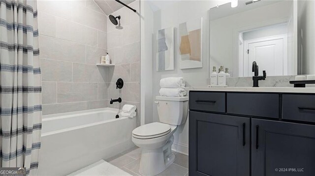 full bathroom with vanity, toilet, shower / tub combo with curtain, and tile patterned floors