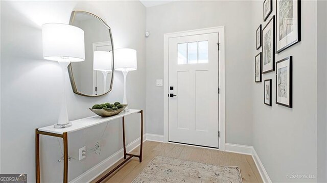 entrance foyer with light hardwood / wood-style floors