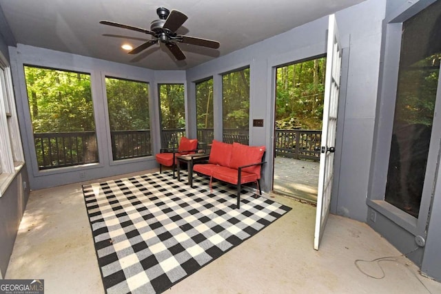 sunroom / solarium with ceiling fan and plenty of natural light