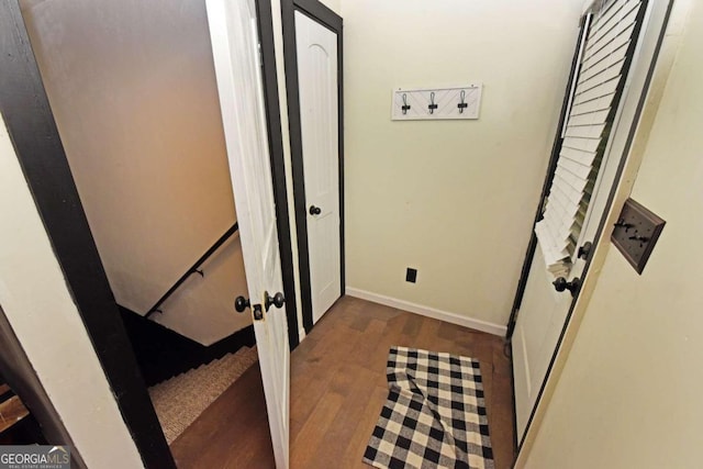 hallway featuring dark hardwood / wood-style floors