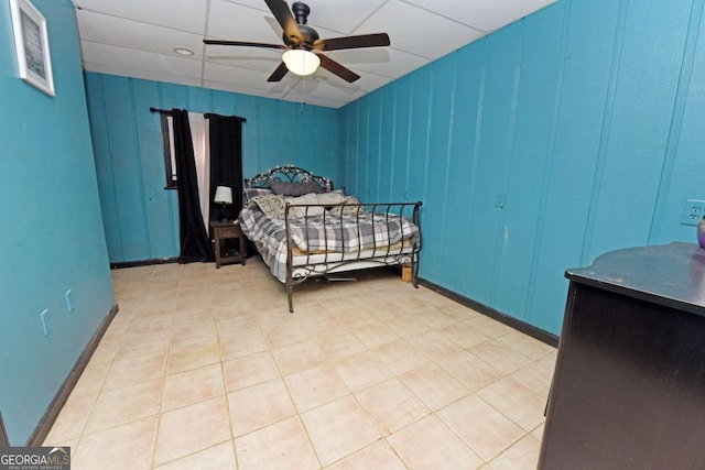 bedroom featuring ceiling fan and light tile patterned flooring