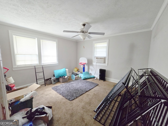 carpeted bedroom featuring a textured ceiling, crown molding, ceiling fan, and cooling unit