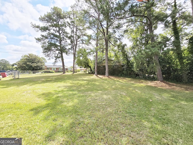 view of yard with fence