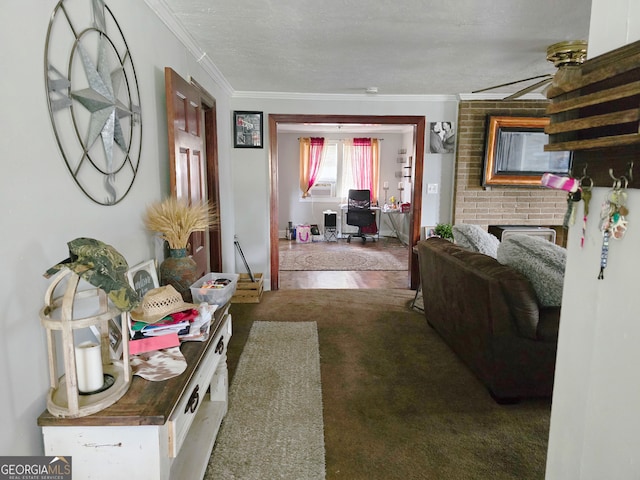 carpeted living room with ornamental molding, a textured ceiling, a brick fireplace, and cooling unit