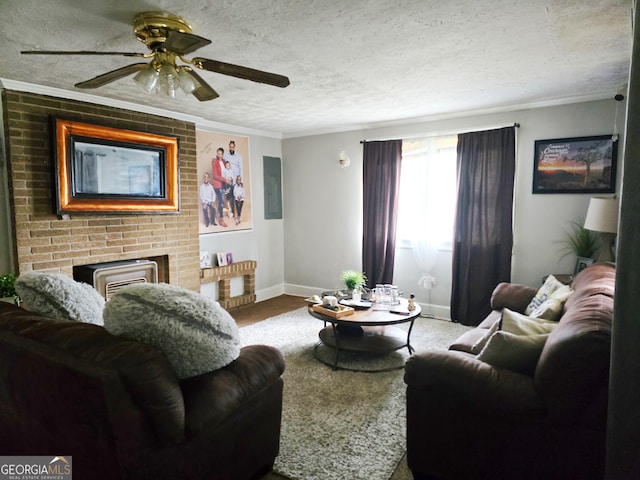 living room with a fireplace, crown molding, a textured ceiling, and ceiling fan