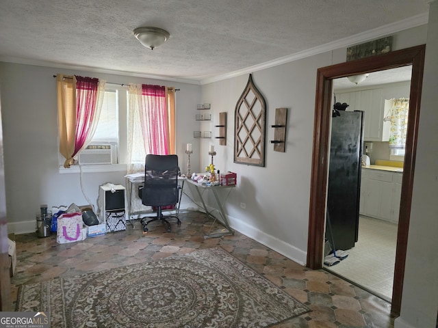 office space featuring a textured ceiling, cooling unit, baseboards, and ornamental molding