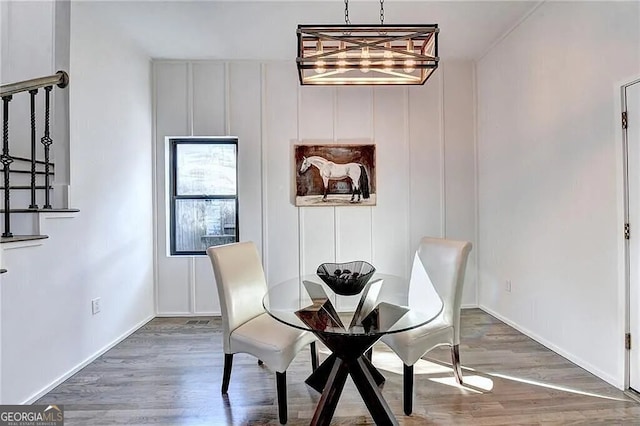 dining room featuring wood-type flooring