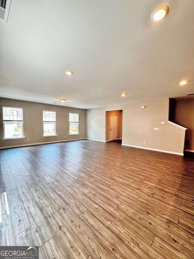 unfurnished living room with light hardwood / wood-style floors