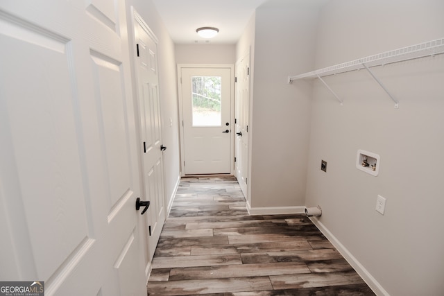 laundry area featuring washer hookup, hardwood / wood-style floors, and electric dryer hookup