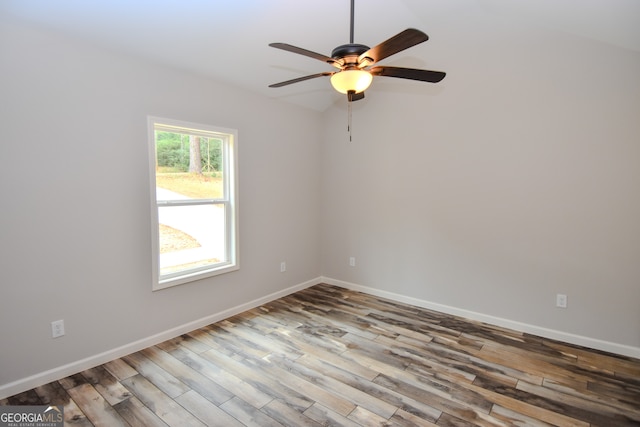 unfurnished room featuring ceiling fan and hardwood / wood-style floors