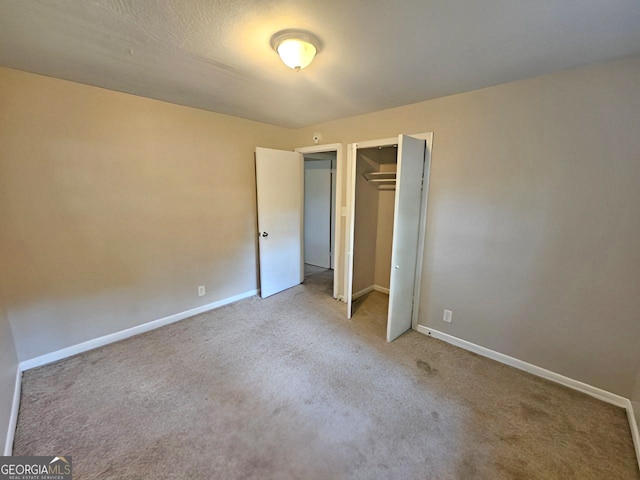 unfurnished bedroom with a closet