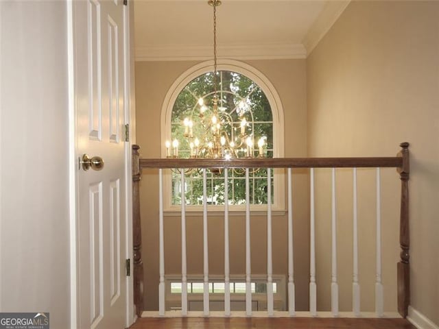 room details with a notable chandelier and ornamental molding