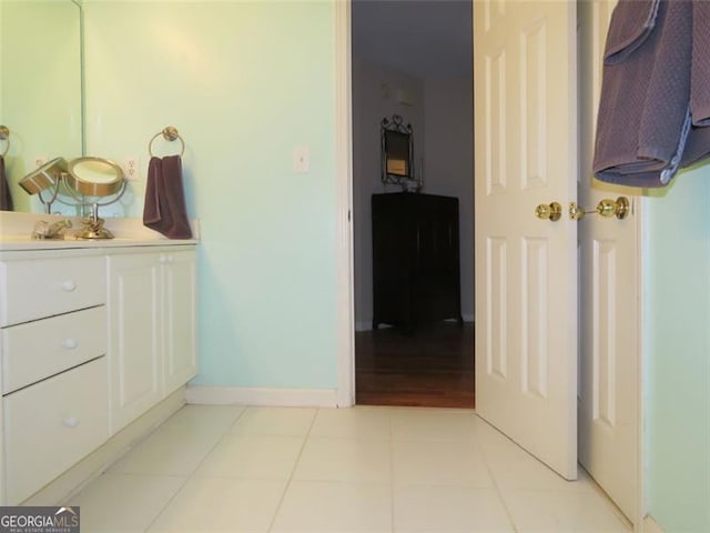 bathroom with vanity and tile patterned floors