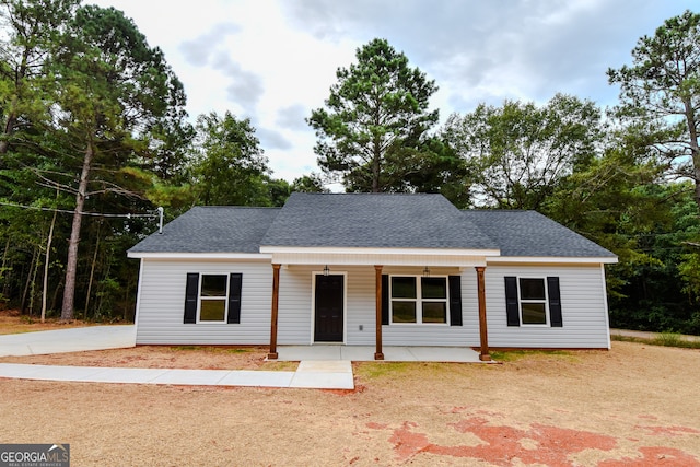 view of front of property featuring covered porch