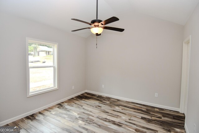 101 Alexandria Way, Thomaston, GA 30286 - spare room with wood finished floors, ceiling fan, vaulted ceiling, and baseboards