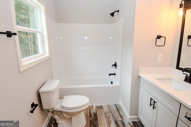 101 Alexandria Way, Thomaston, GA 30286 - bathroom with wood finished floors, toilet, healthy amount of natural light, and vanity