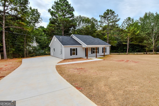 view of front of property featuring covered porch