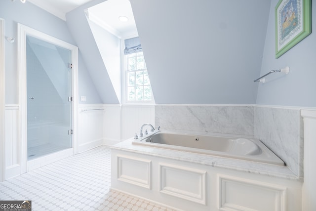 bathroom featuring crown molding and shower with separate bathtub