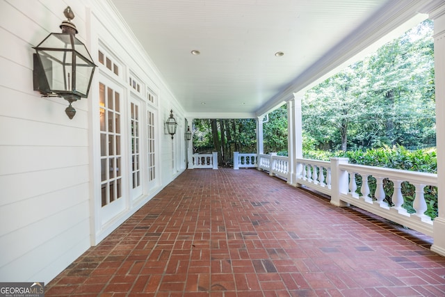 view of patio / terrace with french doors and a porch