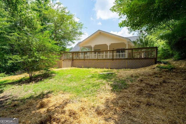 view of yard with a deck