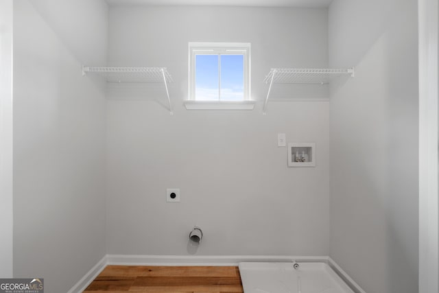 54 Charlie Fuller Rd Lot 3, Grantville, GA 30220 - laundry area featuring wood finished floors, laundry area, hookup for an electric dryer, washer hookup, and baseboards