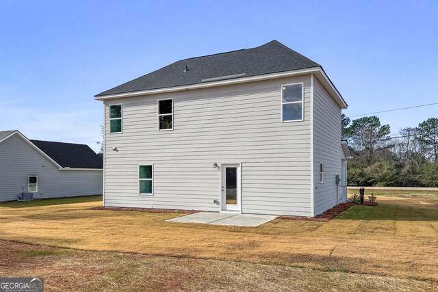 54 Charlie Fuller Rd Lot 3, Grantville, GA 30220 - rear view of property featuring a yard, a patio, and central AC unit