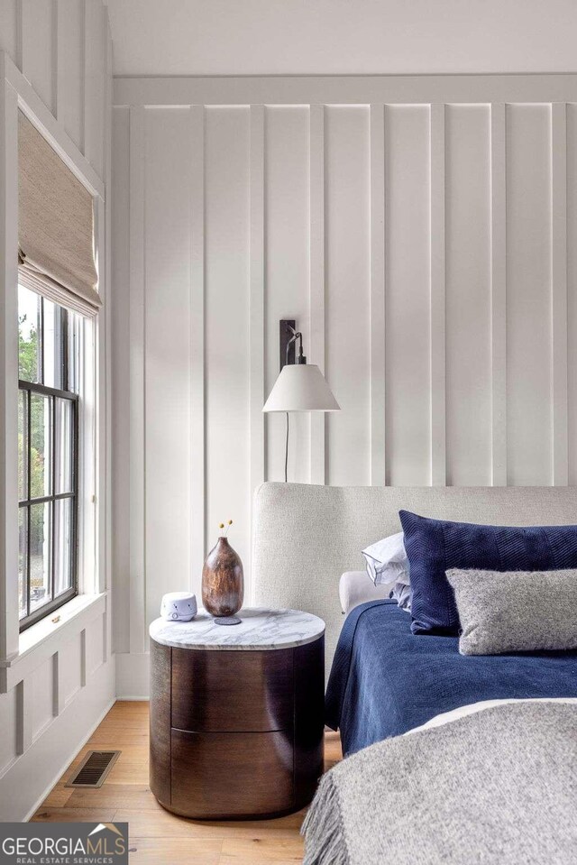 bedroom featuring hardwood / wood-style floors