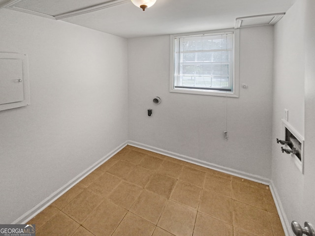 laundry area featuring tile patterned floors